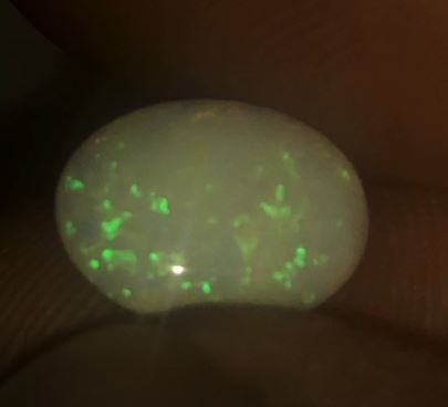 Green pinfire oval cut opal
