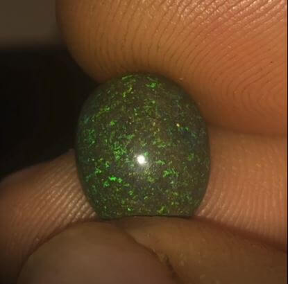 Lovely consistent green colour in this Andamooka matrix opal.