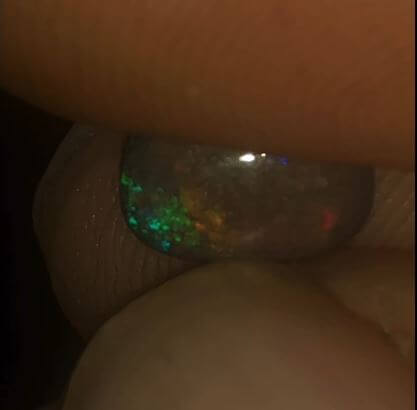 Vibrant green, teal, red and purple Andamooka matrix opal