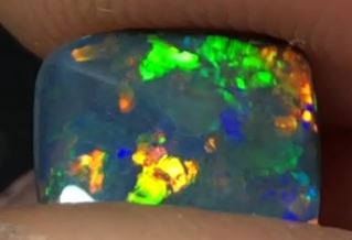 Amazing black opal with a suprise