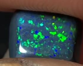 Amazing black opal with a suprise
