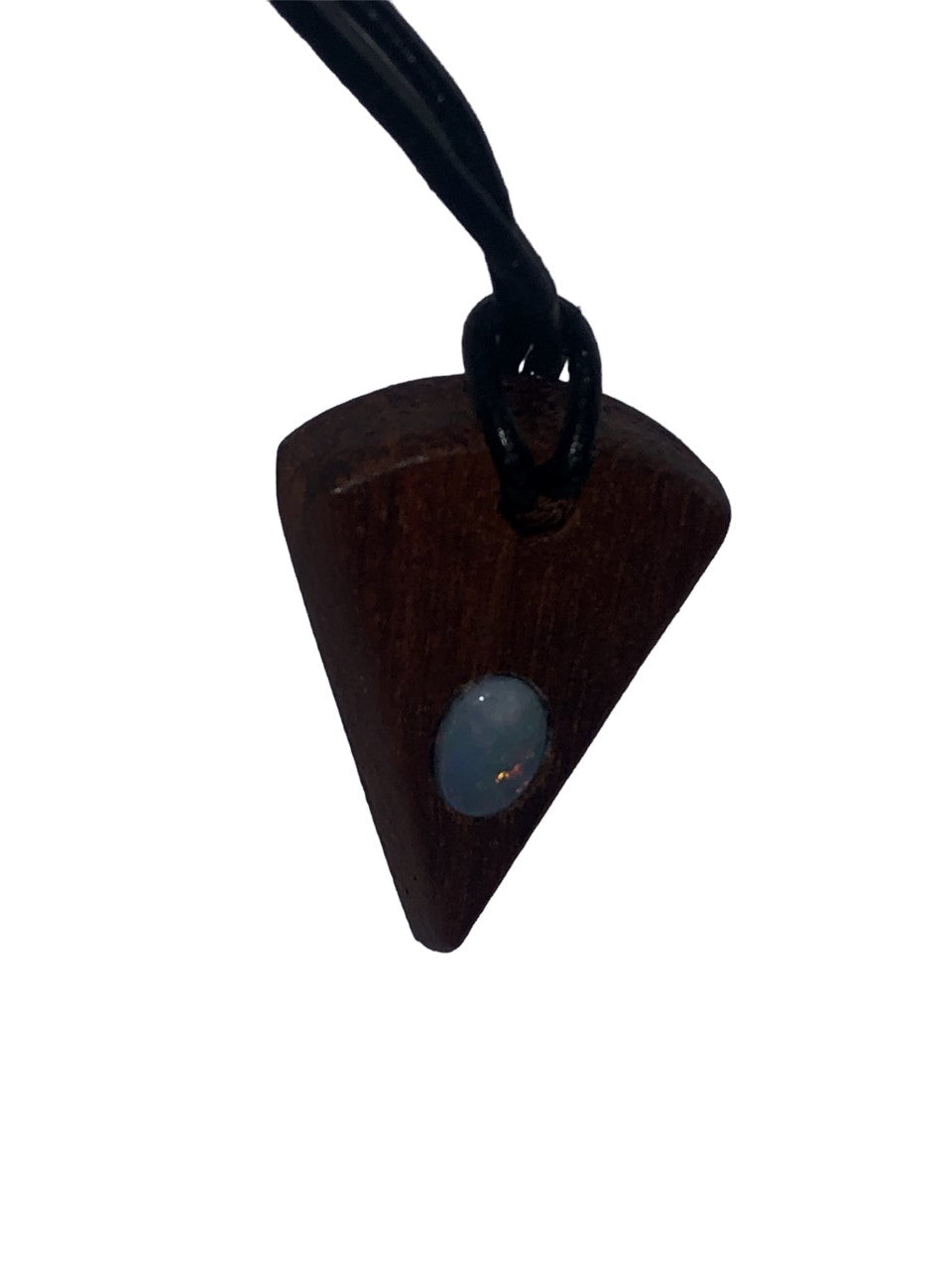 Timber arrowhead shaped pendant with a Coober Pedy opal
