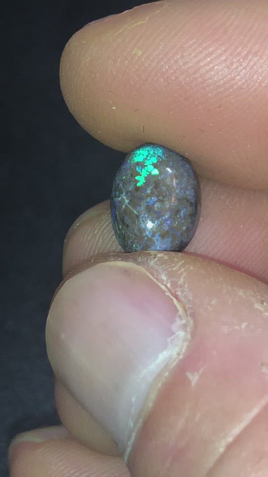 Green and purple matrix opal to suit a ring setting