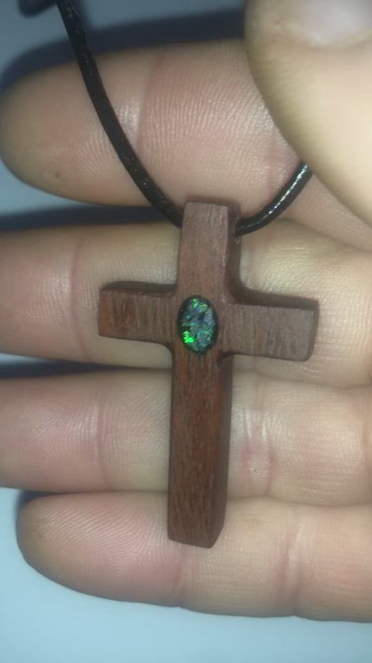 Wooden cross pendant inlaid with opal chips