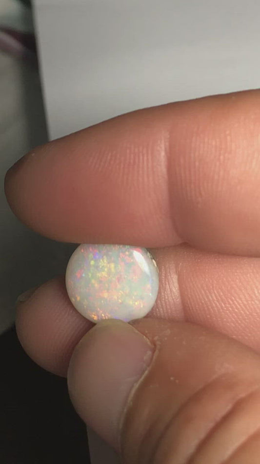Lightning Ridge dark base opal with a rainbow of colours