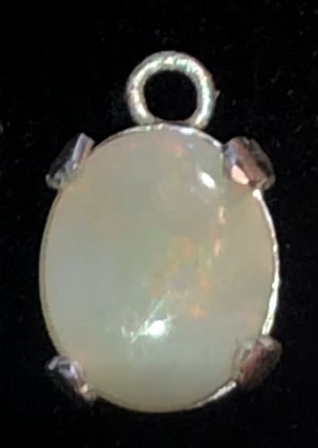 Pastel red in this white opal pendant