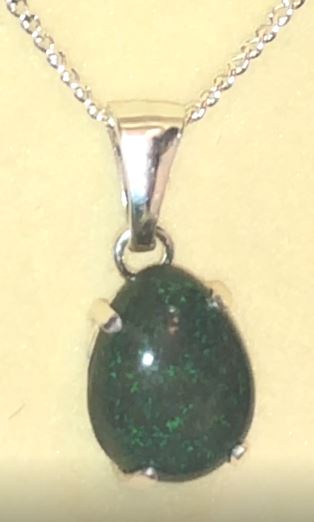 Opal necklace. Green on black matrix opal in solid silver pendant