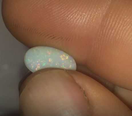 Multicolored oval opal