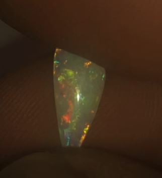 Teal, green, gold and red crystal opal
