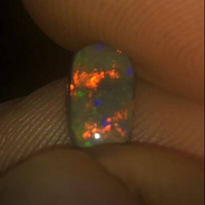 Stunning red, green and purple Andamooka matrix opal