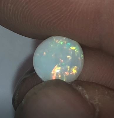 Orange red Coober Pedy round opal