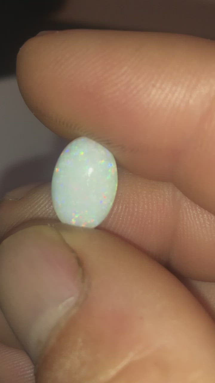 Multicolored oval opal