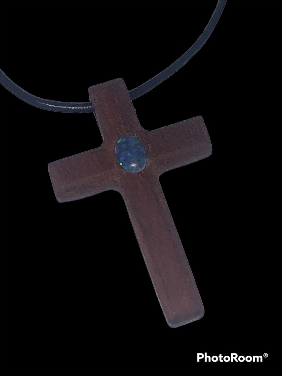 Wooden cross pendant with opal triplet