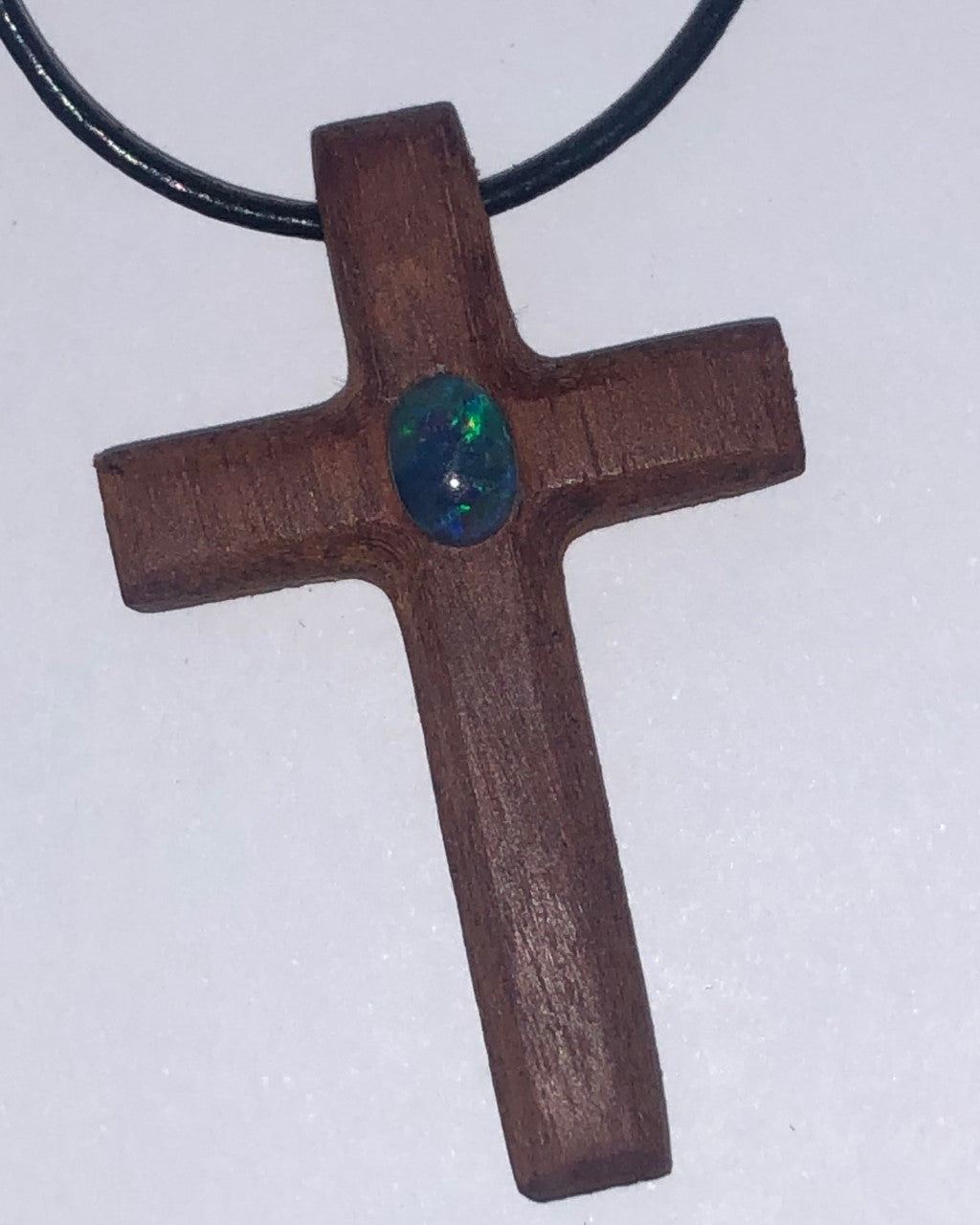 Wooden cross pendant with opal triplet