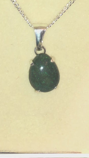 Opal necklace. Green on black matrix opal in solid silver pendant