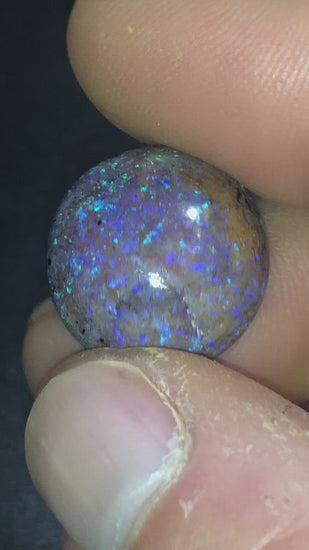 Large purple and green matrix opal.