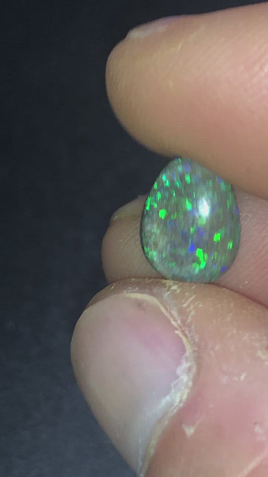 Green and purple pear shaped matrix opal